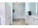 Additional view of the kitchen, featuring tile floors, white appliances, and lots of countertop space at 6015 Catalina Dr. # 134, North Myrtle Beach, SC 29582