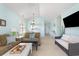 Spacious living room with an open layout, neutral colors, and an archway to the kitchen at 6015 Catalina Dr. # 134, North Myrtle Beach, SC 29582