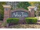 Elegant brick signage marks the entrance to Arbor Trace on Catalina Drive at 6015 Catalina Dr. # 134, North Myrtle Beach, SC 29582