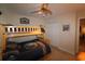 Bedroom with a bunk bed, ceiling fan, closet and door to another room at 6172 Catalina Dr. # 612, North Myrtle Beach, SC 29582