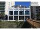 Beach Cabana for Barefoot Resort, featuring a multi-story building with balconies and ocean views at 6172 Catalina Dr. # 612, North Myrtle Beach, SC 29582