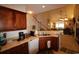Kitchen features light countertops and wood cabinetry at 6172 Catalina Dr. # 612, North Myrtle Beach, SC 29582