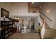 Spacious living room with high ceilings and staircase access at 6172 Catalina Dr. # 612, North Myrtle Beach, SC 29582