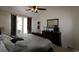 Comfortable main bedroom with a ceiling fan, dresser, and view to the outside at 6172 Catalina Dr. # 612, North Myrtle Beach, SC 29582