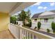 Balcony offers a view of neatly maintained multi-story townhomes and landscaping at 6500 Colonial Dr. # 2, Myrtle Beach, SC 29572