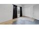 Unfinished room has a window, closet, and door to another area at 6500 Colonial Dr. # 2, Myrtle Beach, SC 29572
