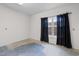 Unfinished room with a window covered by black curtains at 6500 Colonial Dr. # 2, Myrtle Beach, SC 29572