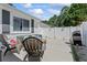 Backyard featuring patio seating, a privacy fence, and a built-in grill at 6630 W Sweetbriar Trail, Myrtle Beach, SC 29588