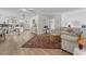 Open-concept living space with stylish furnishings, natural light, and a seamless flow to the dining area at 6630 W Sweetbriar Trail, Myrtle Beach, SC 29588