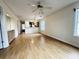 Open concept living room with kitchen in the background at 665 Tupelo Ln. # 17-D, Longs, SC 29568