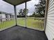 Screened in patio with a view of the lawn at 665 Tupelo Ln. # 17-D, Longs, SC 29568