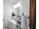 Practical bathroom with a white vanity, storage cabinet and modern fixtures, blending style with functionality at 67 Bossie Ln., Georgetown, SC 29440