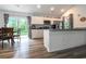 Charming kitchen with granite countertops, stainless steel appliances, and breakfast bar seating at 67 Bossie Ln., Georgetown, SC 29440
