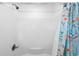 Clean shower with shower head, updated fixtures, and stylish curtain, offering a refreshing experience at 67 Bossie Ln., Georgetown, SC 29440