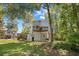 Two-story home with a deck, partially covered backyard and patio area at 739 Tall Oaks Dr., Myrtle Beach, SC 29588