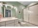 Bright bathroom with double vanity, modern lighting, and a glass shower, perfect for a fresh start at 9 Winnowing Way, Pawleys Island, SC 29585