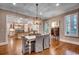 Elegant dining room with a stylish light fixture and views into the living spaces at 9 Winnowing Way, Pawleys Island, SC 29585