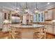 Gourmet kitchen features stainless steel appliances, custom cabinetry, and a center island at 9 Winnowing Way, Pawleys Island, SC 29585