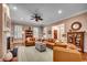 Well-lit living room with hardwood floors, a fireplace, and elegant decor at 9 Winnowing Way, Pawleys Island, SC 29585
