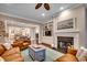 Comfortable living room with a fireplace, built-in shelves, and ample seating area at 9 Winnowing Way, Pawleys Island, SC 29585