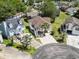 Aerial view of the beach house, showcasing its well-maintained yard, surrounding landscape, and prime location in the community at 914 Dock Pl., Murrells Inlet, SC 29576