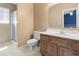 Bathroom with sink vanity, toilet, and walk-in shower at 914 Dock Pl., Murrells Inlet, SC 29576