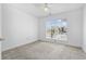 Bedroom featuring a window with natural light, carpet flooring, and white walls at 914 Dock Pl., Murrells Inlet, SC 29576