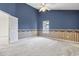 Bedroom area features neutral carpeting, chair rail, and a ceiling fan at 914 Dock Pl., Murrells Inlet, SC 29576