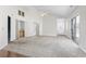 Open-concept living room with vaulted ceilings and a wet bar at 914 Dock Pl., Murrells Inlet, SC 29576