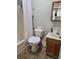 A compact bathroom with a toilet, shower, vanity, grab bar, and necessary amenities at 1025 W Plantation Dr. W # 2817, Little River, SC 29566
