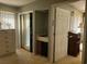 A well lit bedroom features a closet, vanity with sink, and built in dresser at 1025 W Plantation Dr. W # 2817, Little River, SC 29566