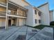 Modern exterior design highlighting a multi-story building with private balconies and covered entrances at 1025 W Plantation Dr. W # 2817, Little River, SC 29566