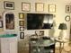 Living room with unique wall decor, glass shelving, and a modern lamp providing warm light at 1025 W Plantation Dr. W # 2817, Little River, SC 29566