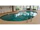 Indoor pool with walk-in steps and five feet depth, offering a relaxing retreat within the property at 1025 W Plantation Dr. W # 2817, Little River, SC 29566