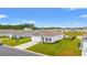 Aerial view of home featuring manicured lawn and landscaping in a well-planned community at 1031 Corn Husk Loop, Conway, SC 29527