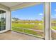 A view from the patio of the backyard with pond views and fenced in yard at 1031 Corn Husk Loop, Conway, SC 29527