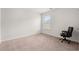 A vacant bedroom showcasing neutral carpeting and a window providing ample natural light at 1031 Corn Husk Loop, Conway, SC 29527