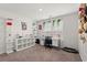 Comfortable bedroom with bright window, workspace and shelving at 1031 Corn Husk Loop, Conway, SC 29527