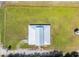 Birds-eye view of home with silver metal roof surrounded by large green lawn at 1039 Forest Dr., Conway, SC 29526