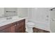Modern bathroom with sleek vanity, updated toilet, and shower-tub combination at 1039 Forest Dr., Conway, SC 29526