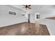 Spacious bedroom with lots of natural light, new vinyl floors, and ceiling fan at 1039 Forest Dr., Conway, SC 29526