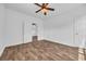 Bedroom with ceiling fan, modern floors, and an open doorway at 1039 Forest Dr., Conway, SC 29526