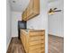 Cozy kitchenette features modern finishes and space-saving built-in storage, with durable vinyl flooring at 1039 Forest Dr., Conway, SC 29526