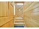 Stairway featuring natural wood paneled walls and steps at 1039 Forest Dr., Conway, SC 29526