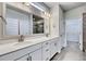 Bathroom featuring double vanity and large mirror at 1095 Laconic Dr., Myrtle Beach, SC 29588