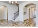 A charming staircase with wood and iron accents, with access to the kitchen area at 1095 Laconic Dr., Myrtle Beach, SC 29588
