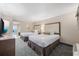 Bright bedroom with two beds, lamps, TV, dresser, and a balcony overlooking the ocean at 1105 S Ocean Blvd. # 520, Myrtle Beach, SC 29577