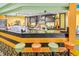 Colorful ice cream bar with multiple stools and a wide array of ice cream options at 1105 S Ocean Blvd. # 520, Myrtle Beach, SC 29577