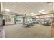 Large meeting room with tables and chairs and large windows for great natural light at 1105 S Ocean Blvd. # 520, Myrtle Beach, SC 29577