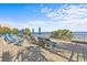 Oceanfront patio featuring lounge chairs and umbrellas overlooking the beach and ocean views at 1105 S Ocean Blvd. # 520, Myrtle Beach, SC 29577